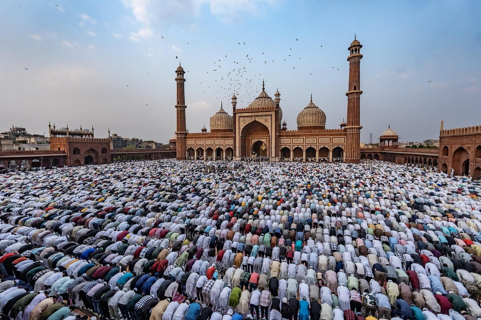 Worshippers standing in rows for congregational prayer at Jama Masjid in Delhi