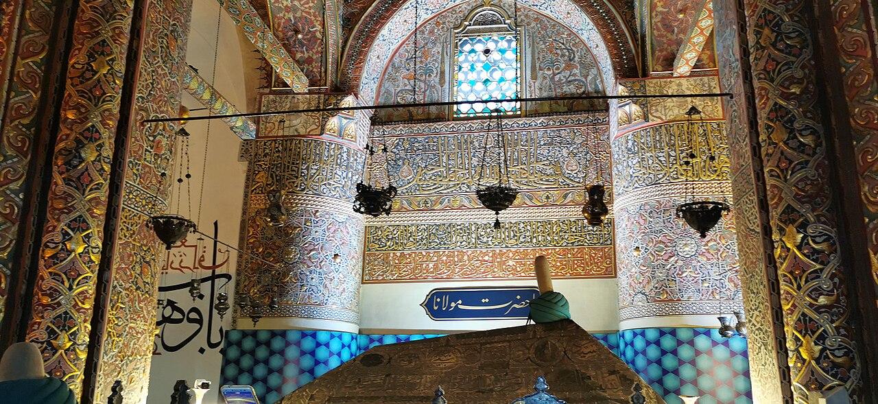 Green-tiled dome of the Mevlana Museum in Konya, associated with Rumi